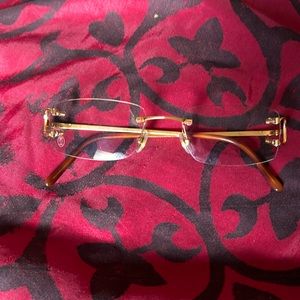 18 karat gold Cartier glasses transitions, not prescription